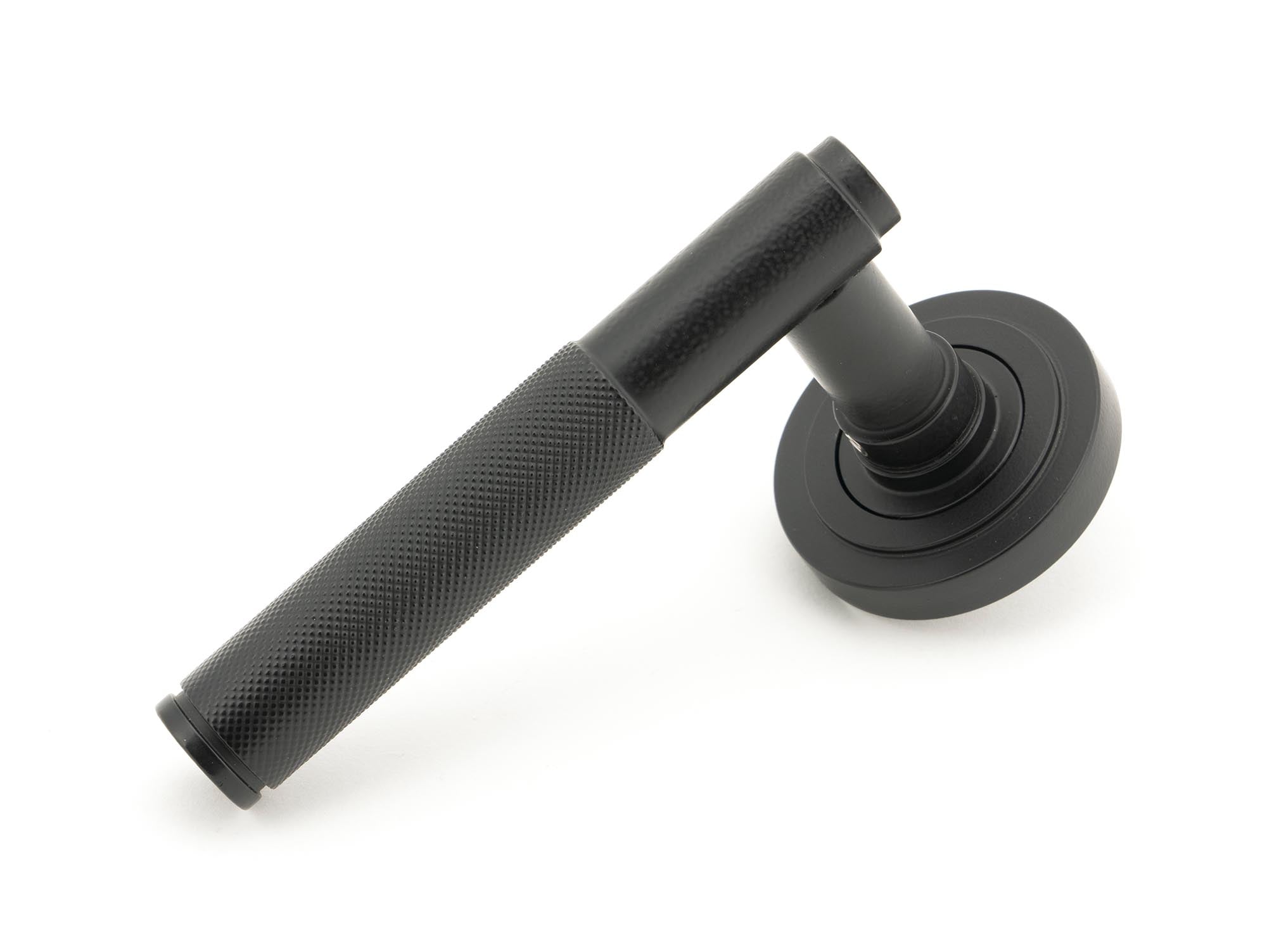 From The Anvil's Matt Black Brompton Lever on Rose Set (Sprung)