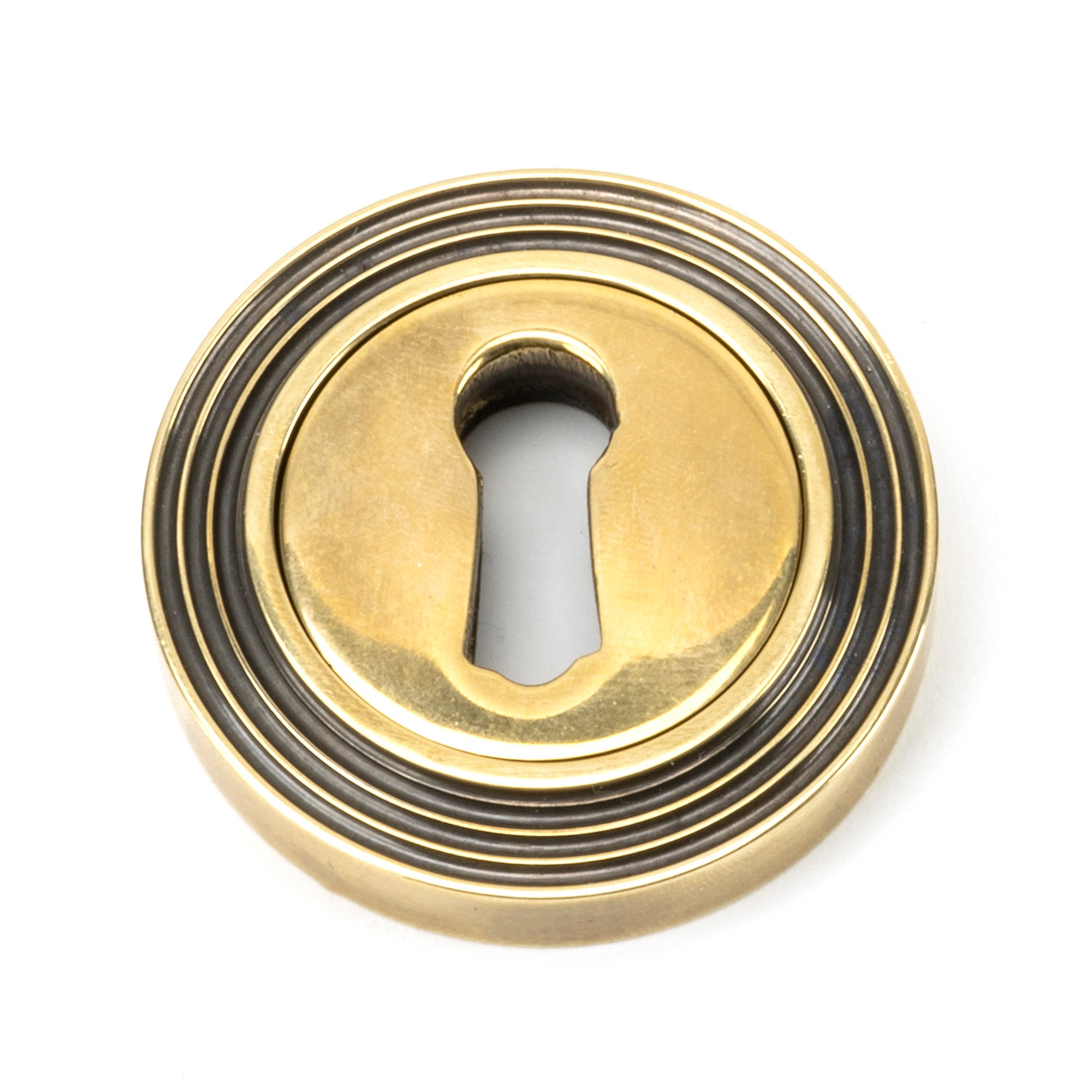 From The Anvil's Aged Brass Round Escutcheon