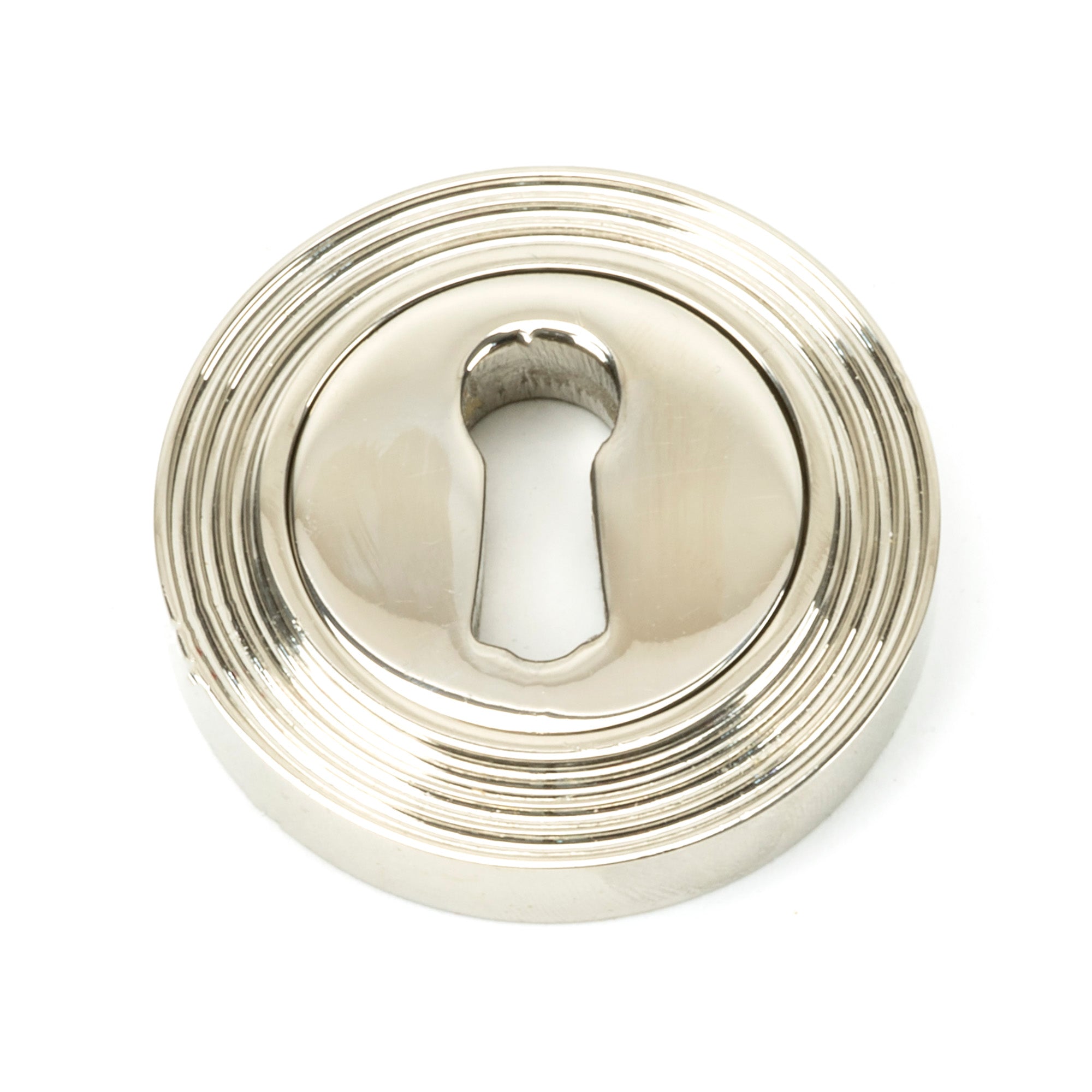 From The Anvil's Polished Nickel Round Escutcheon