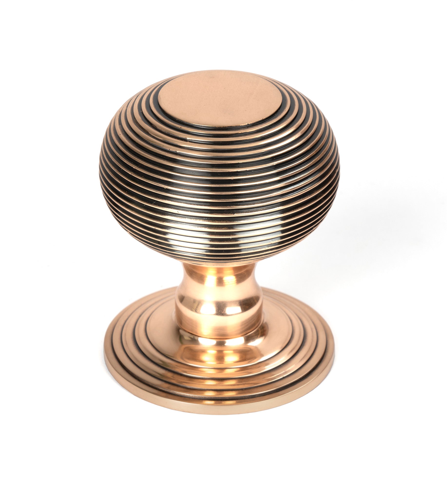 From The Anvil's Polished Bronze Beehive Centre Door Knob