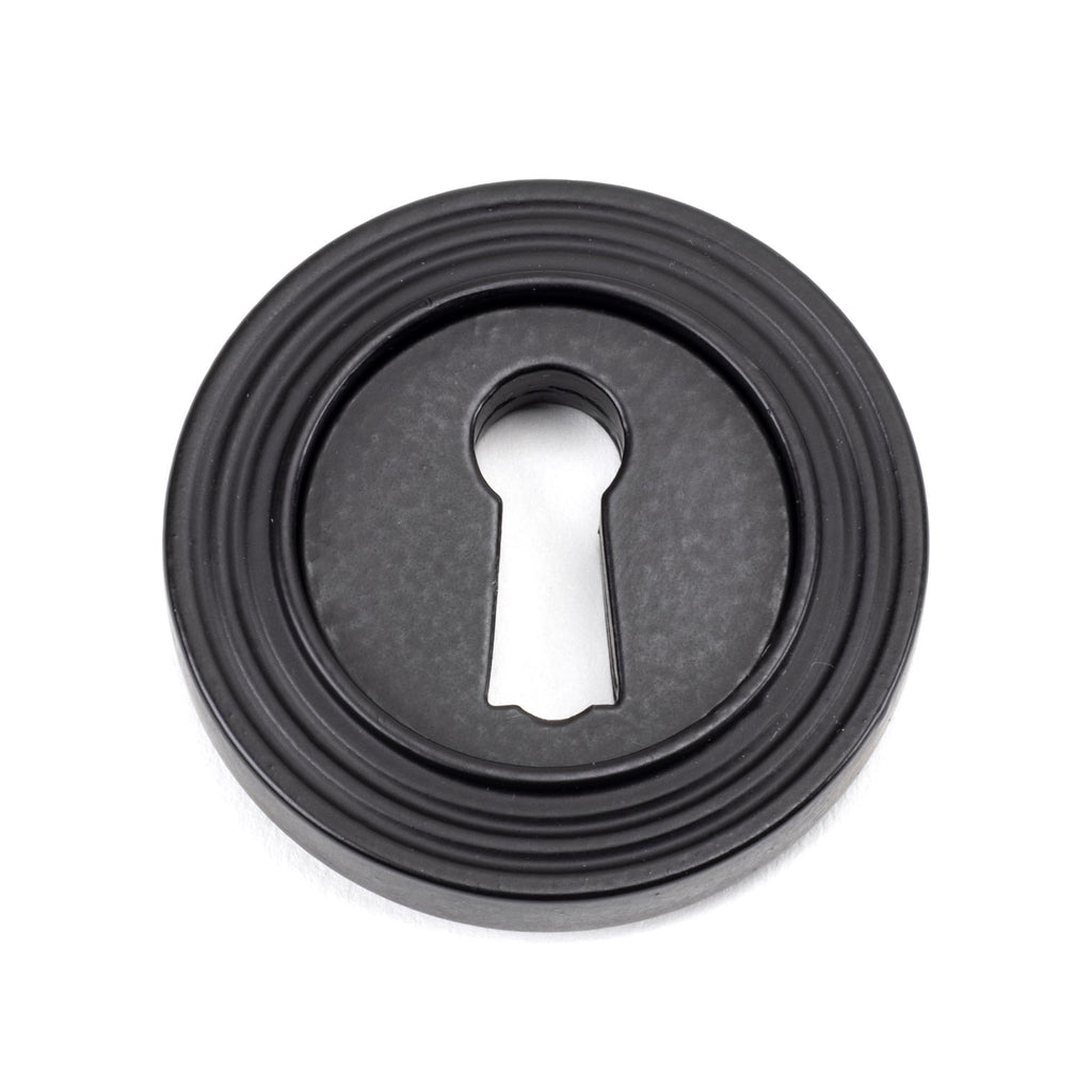 White background image of From The Anvil's Matt Black Round Escutcheon | From The Anvil