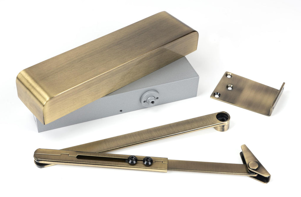 White background image of From The Anvil's Aged Brass Size 2-5 Door Closer | From The Anvil