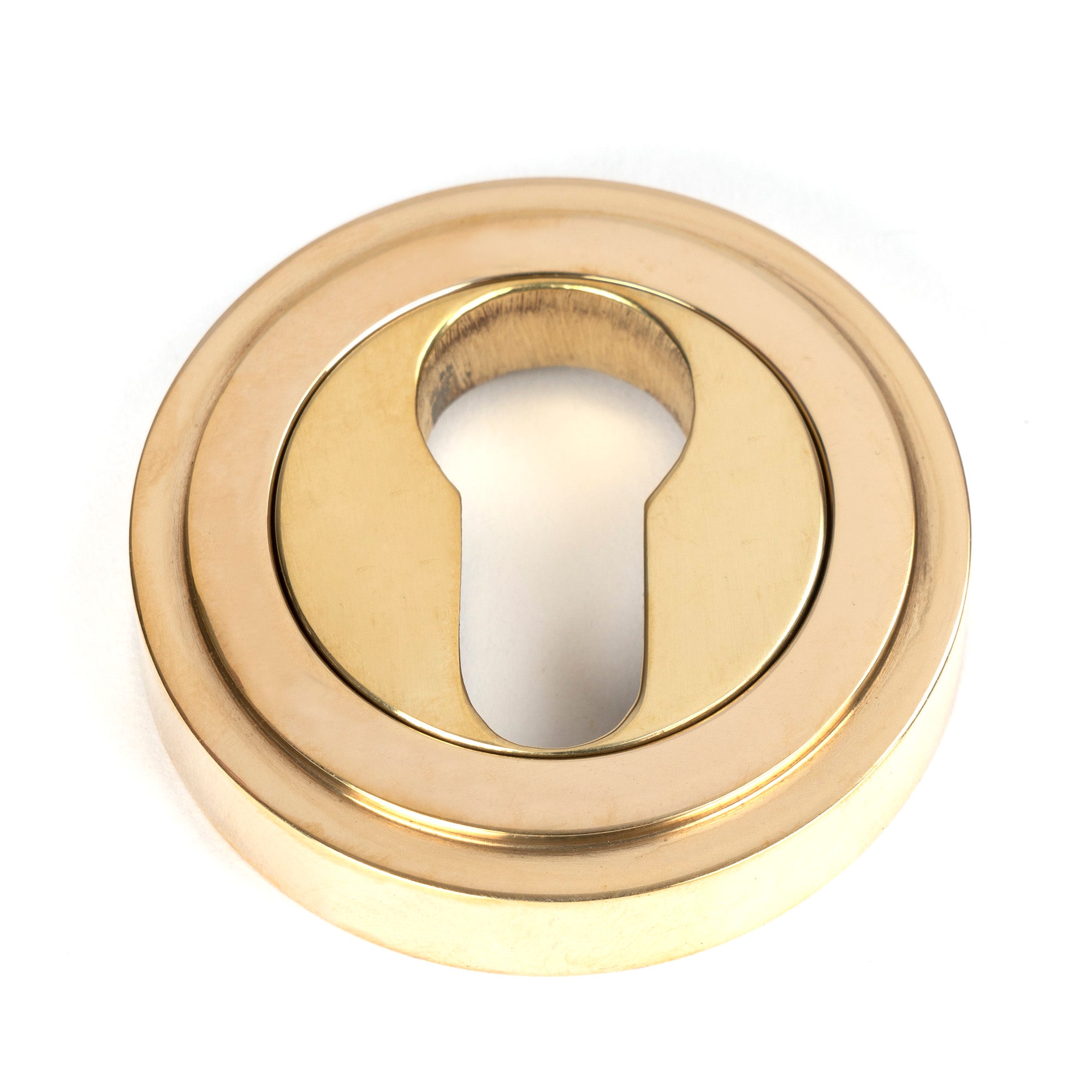 From The Anvil's Polished Brass Round Euro Escutcheon