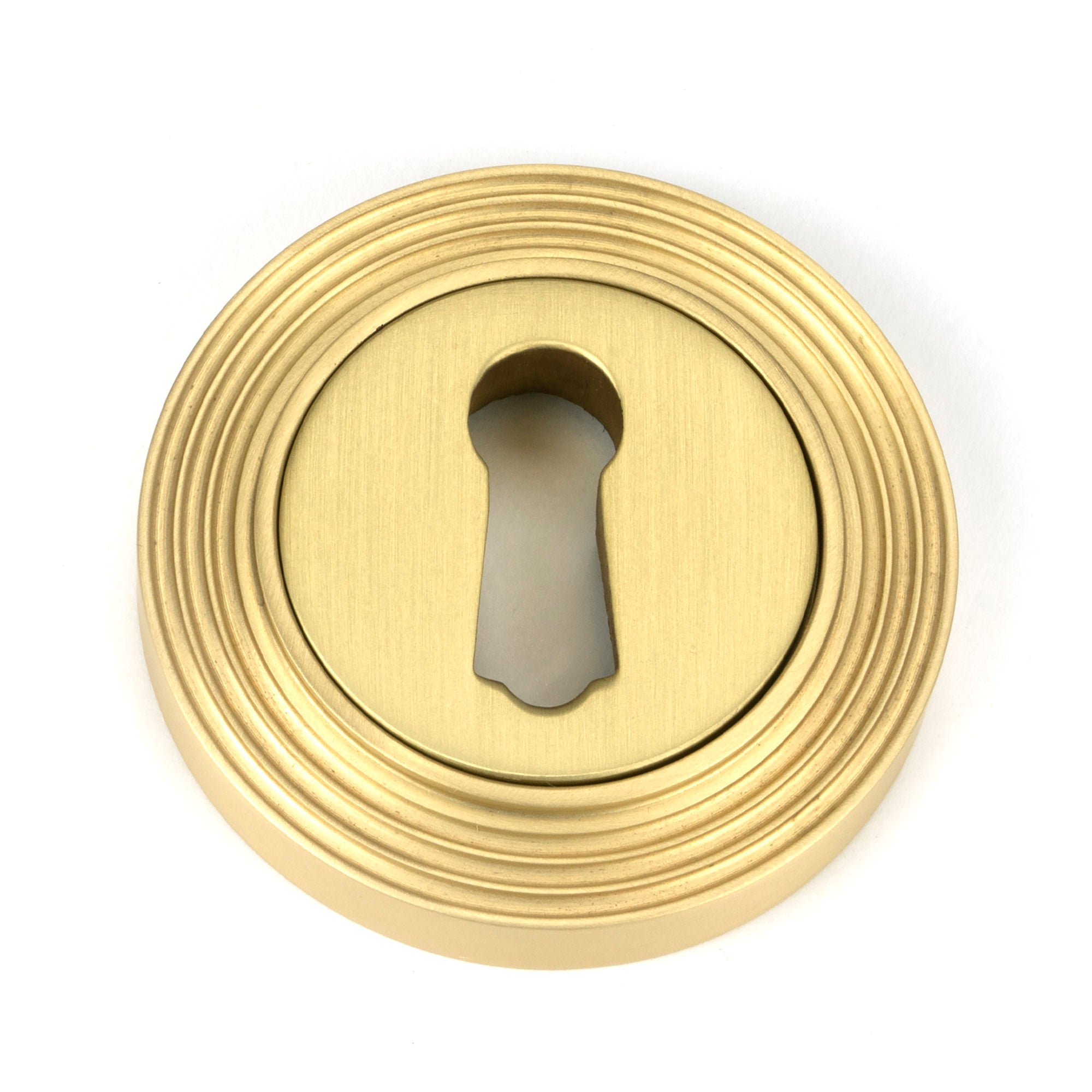 From The Anvil's Satin Brass Round Escutcheon