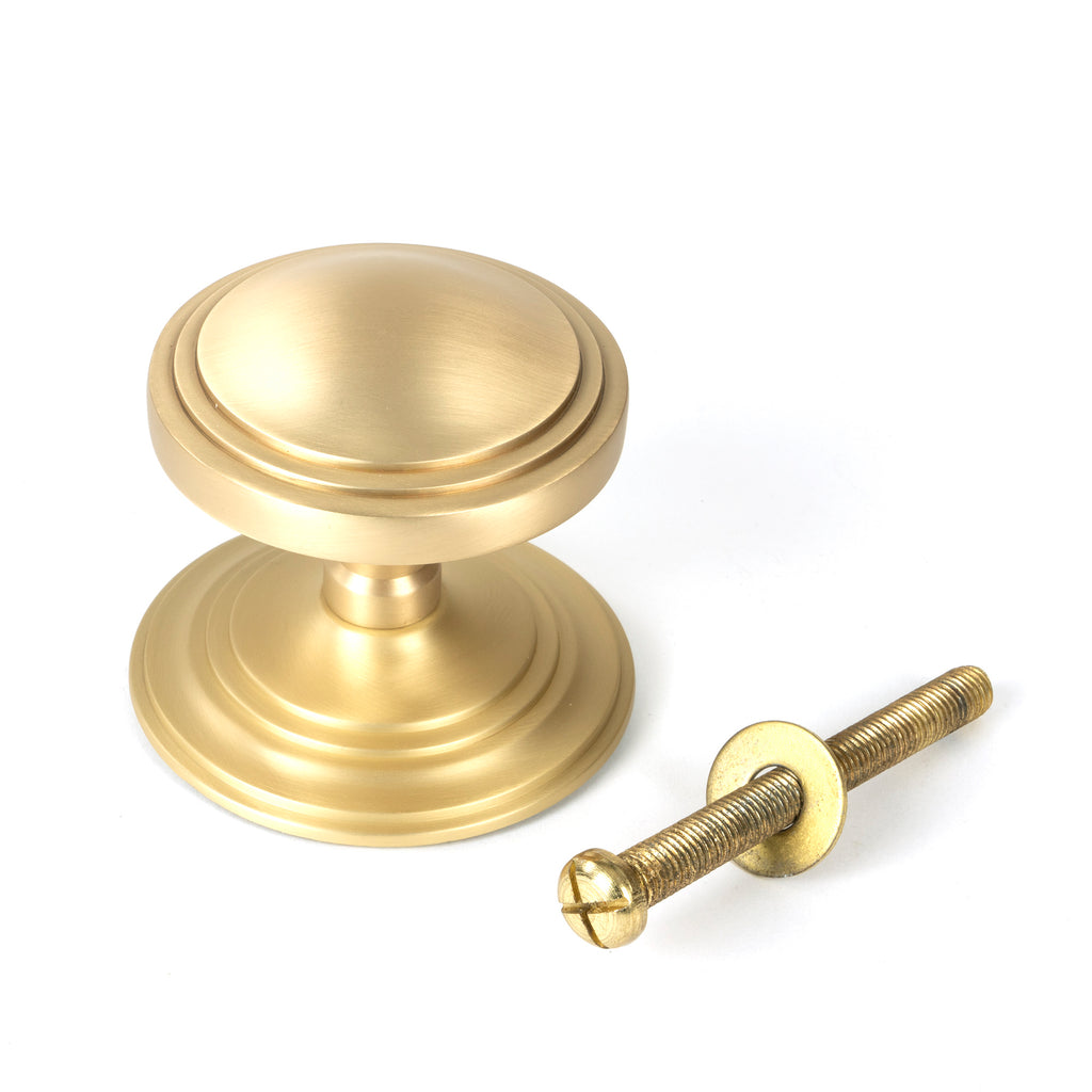 White background image of From The Anvil's Satin Brass Art Deco Centre Door Knob | From The Anvil