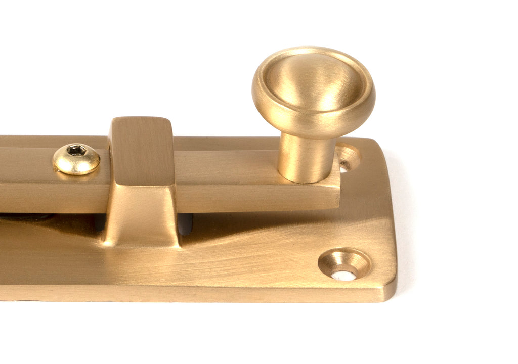 White background image of From The Anvil's Satin Brass Universal Bolt | From The Anvil