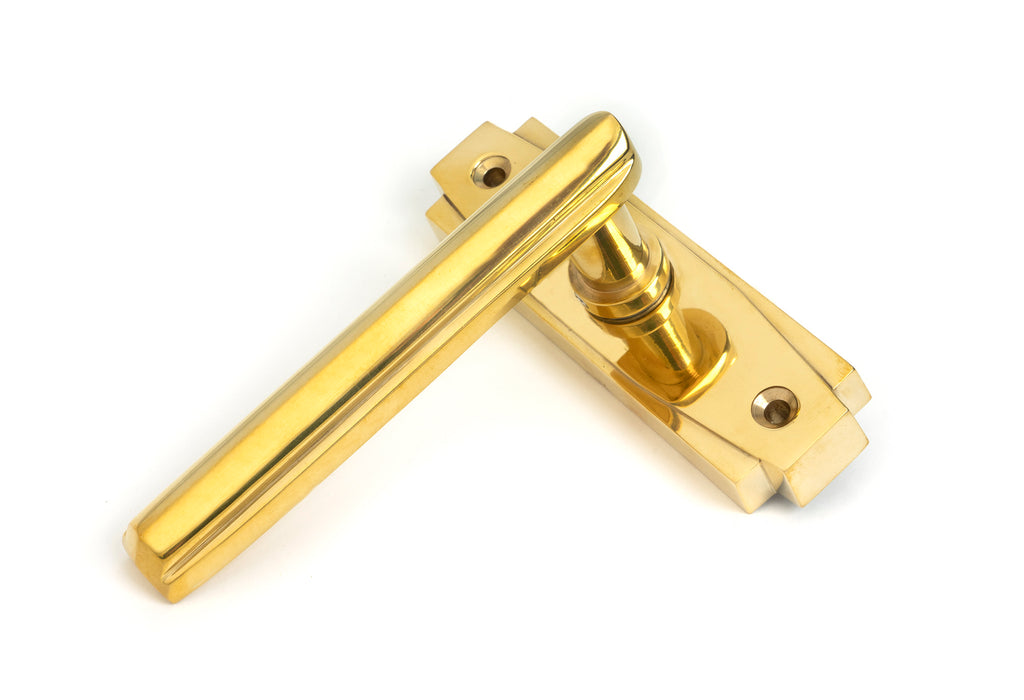 White background image of From The Anvil's Polished Brass Art Deco Lever on Rose Set | From The Anvil