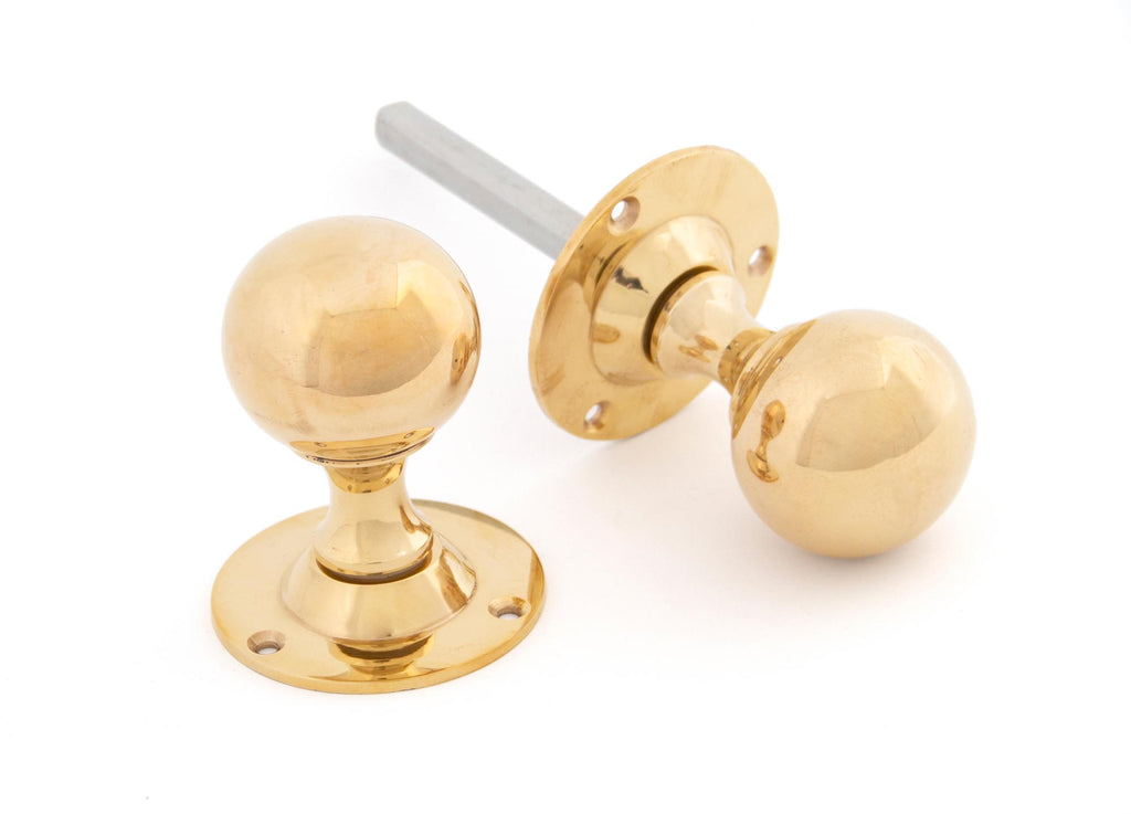 White background image of From The Anvil's Polished Brass Ball Mortice Knob Set | From The Anvil