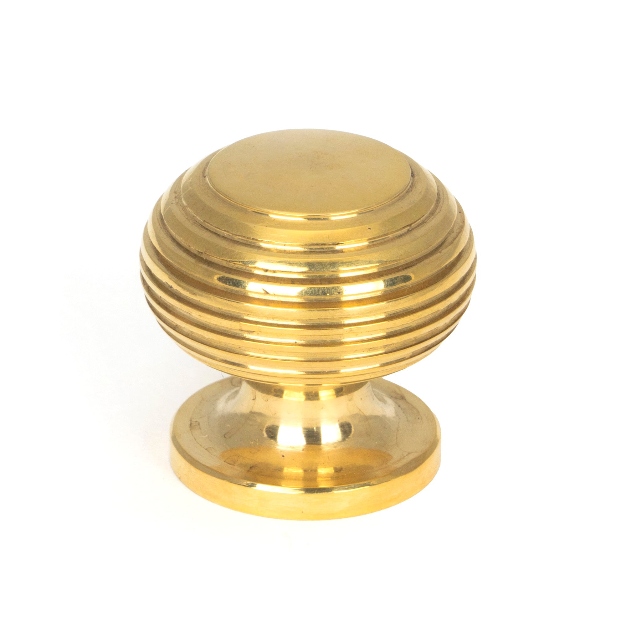 From The Anvil's Polished Brass Beehive Cabinet Knob