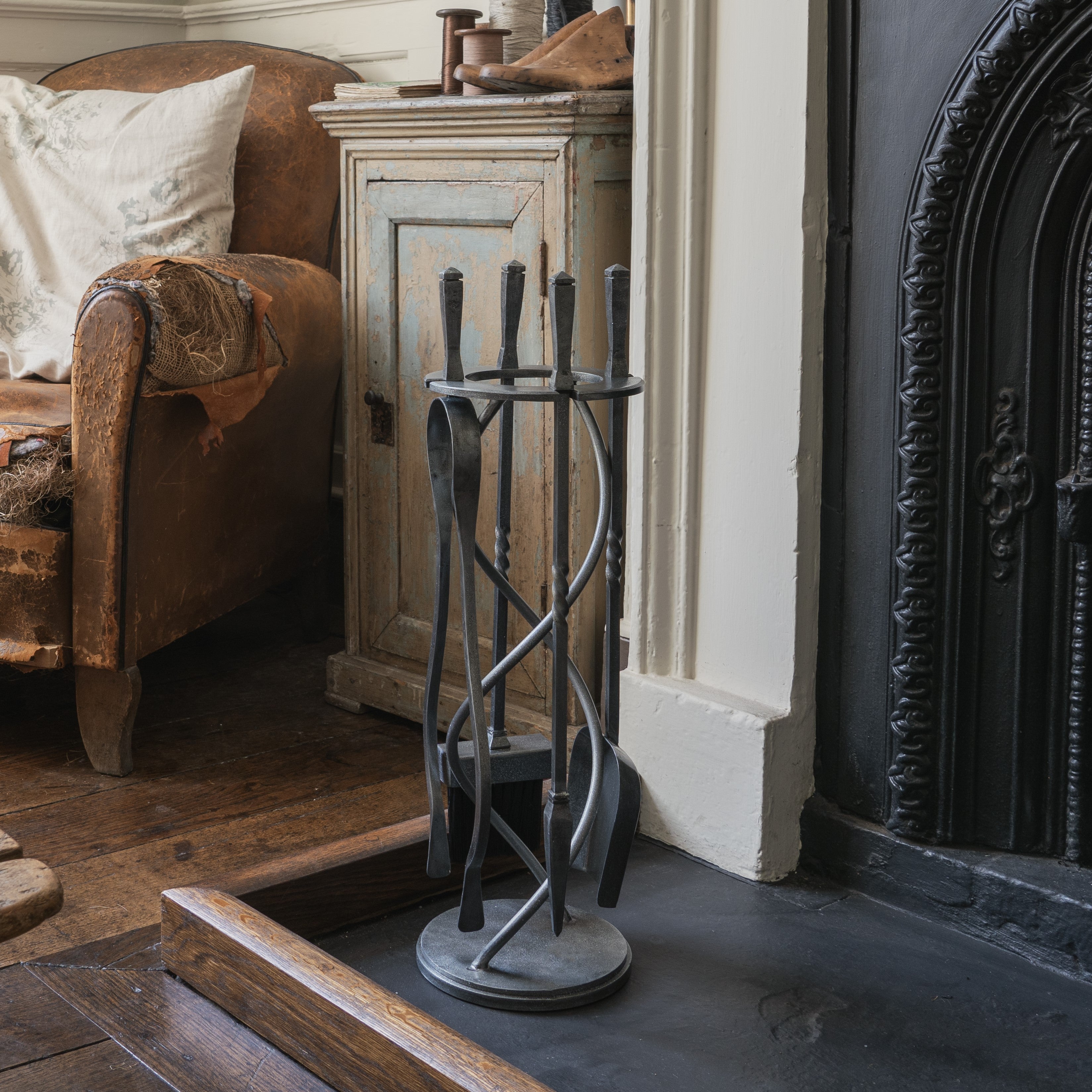 From The Anvil Pewter Spiral fireside companion set with tongs, dustpan, brush, poker, and stand