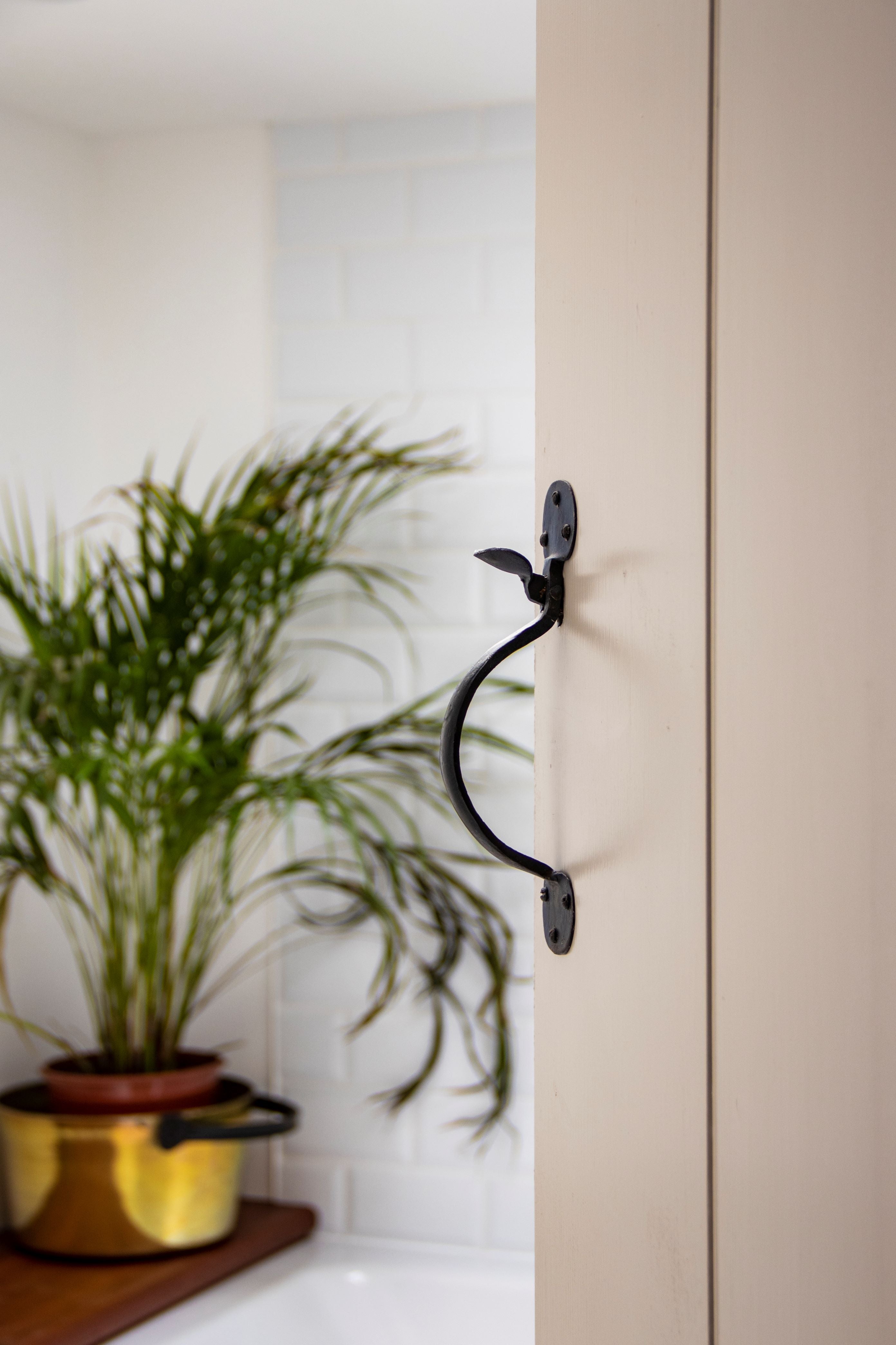 From The Anvil's Black thumblatch on a painted ledge and brace door.