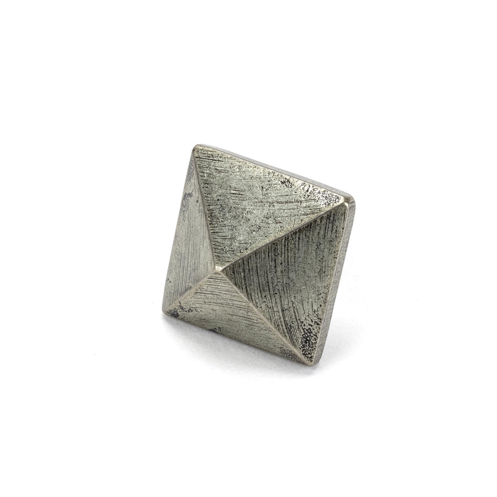 White background image of From The Anvil's Pewter Patina Pyramid Door Stop | From The Anvil