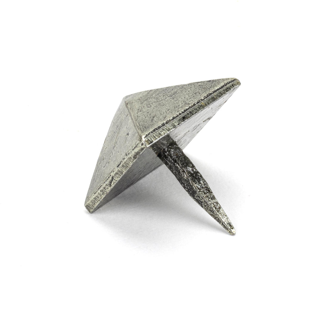 White background image of From The Anvil's Pewter Patina Pyramid Door Stop | From The Anvil