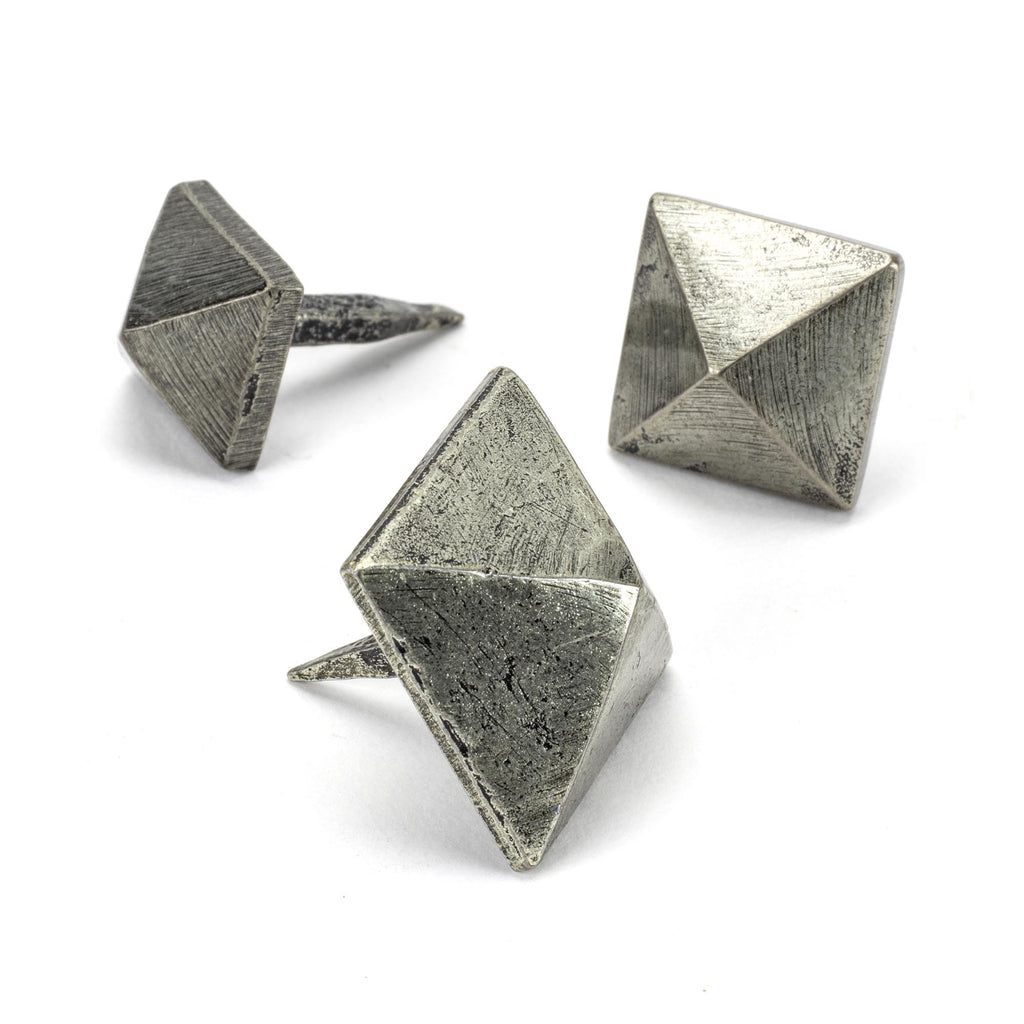 White background image of From The Anvil's Pewter Patina Pyramid Door Stop | From The Anvil