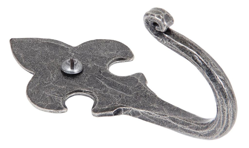 White background image of From The Anvil's Pewter Patina Fleur-De-Lys Coat Hook | From The Anvil