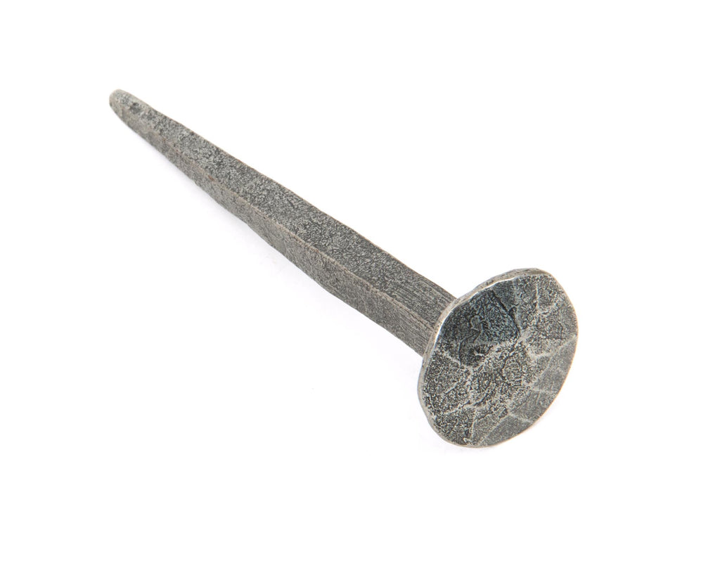 White background image of From The Anvil's Pewter Patina Handmade Nail | From The Anvil
