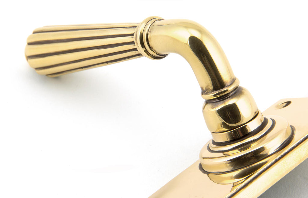 White background image of From The Anvil's Aged Brass Hinton Lever Bathroom Set | From The Anvil