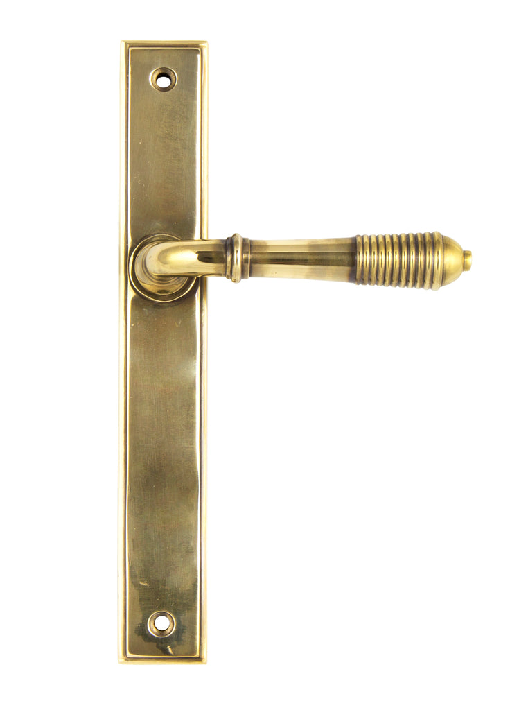 From The Anvil's Aged Brass Reeded Slimline Lever Espag. Latch Set