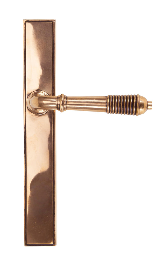 White background image of From The Anvil's Polished Bronze Reeded Slimline Lever Espag. Latch Set | From The Anvil