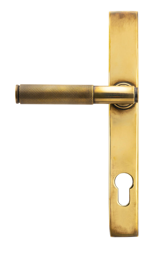 White background image of From The Anvil's Aged Brass Brompton Slimline Lever Espag. Lock Set | From The Anvil