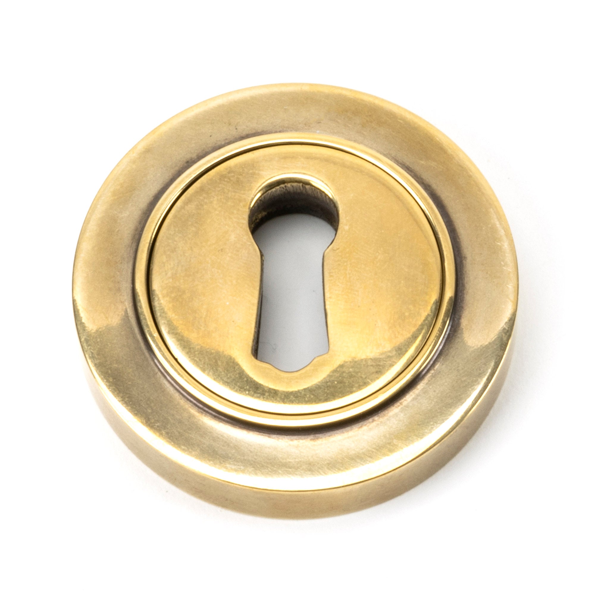 From The Anvil's Aged Brass Round Escutcheon