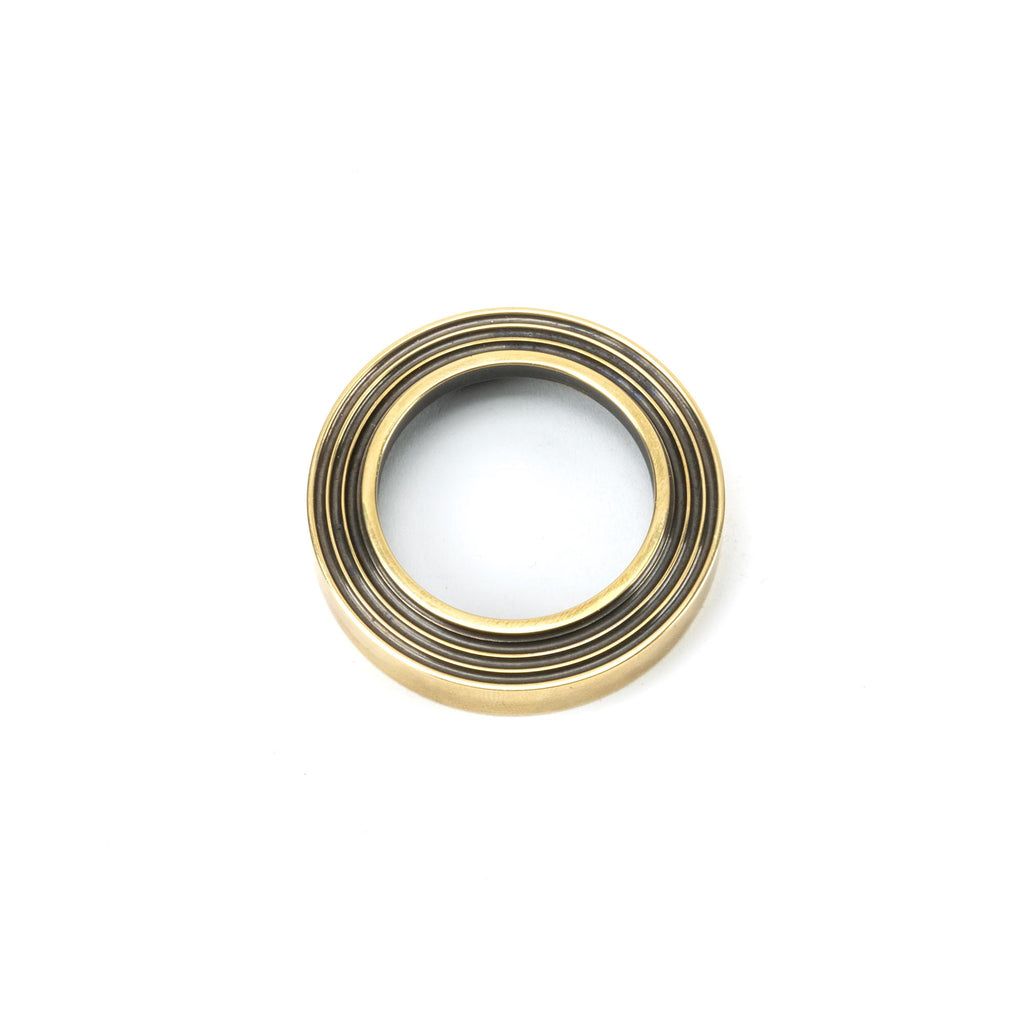 White background image of From The Anvil's Aged Brass Round Euro Escutcheon | From The Anvil