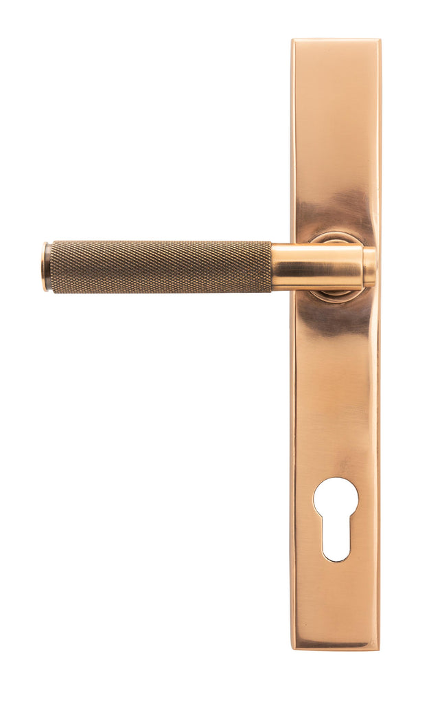 White background image of From The Anvil's Polished Bronze Brompton Slimline Lever Espag. Lock Set | From The Anvil