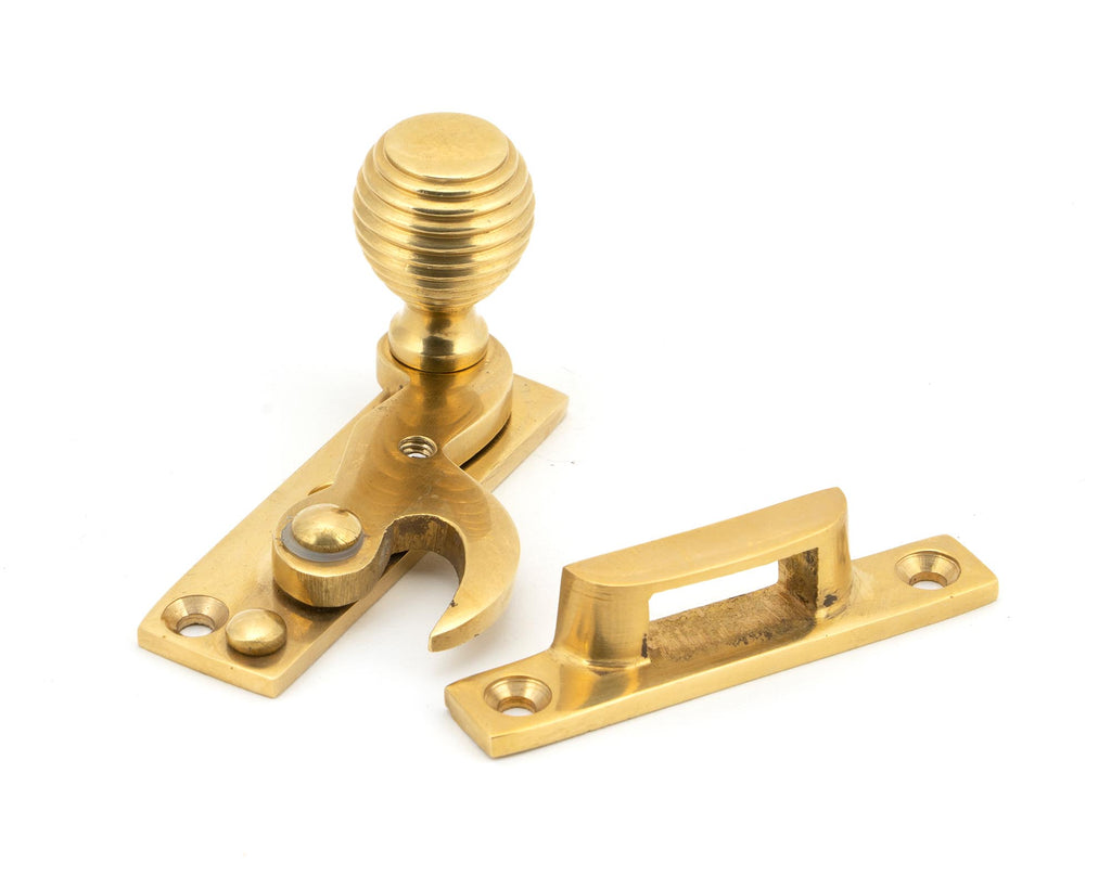 White background image of From The Anvil's Polished Brass Beehive Sash Hook Fastener | From The Anvil