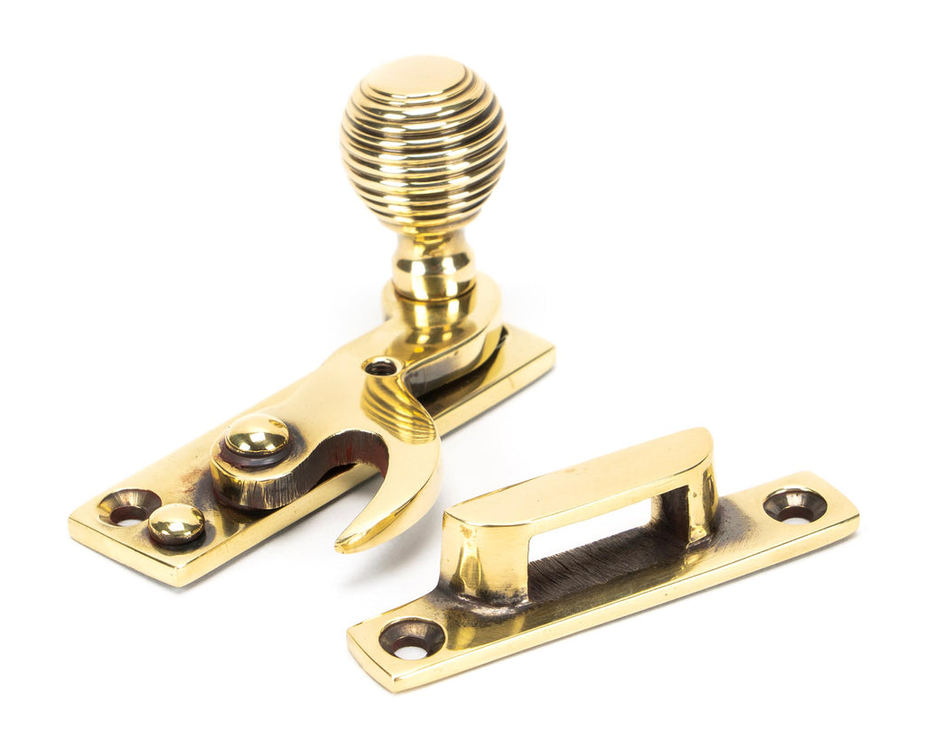 White background image of From The Anvil's Aged Brass Beehive Sash Hook Fastener | From The Anvil