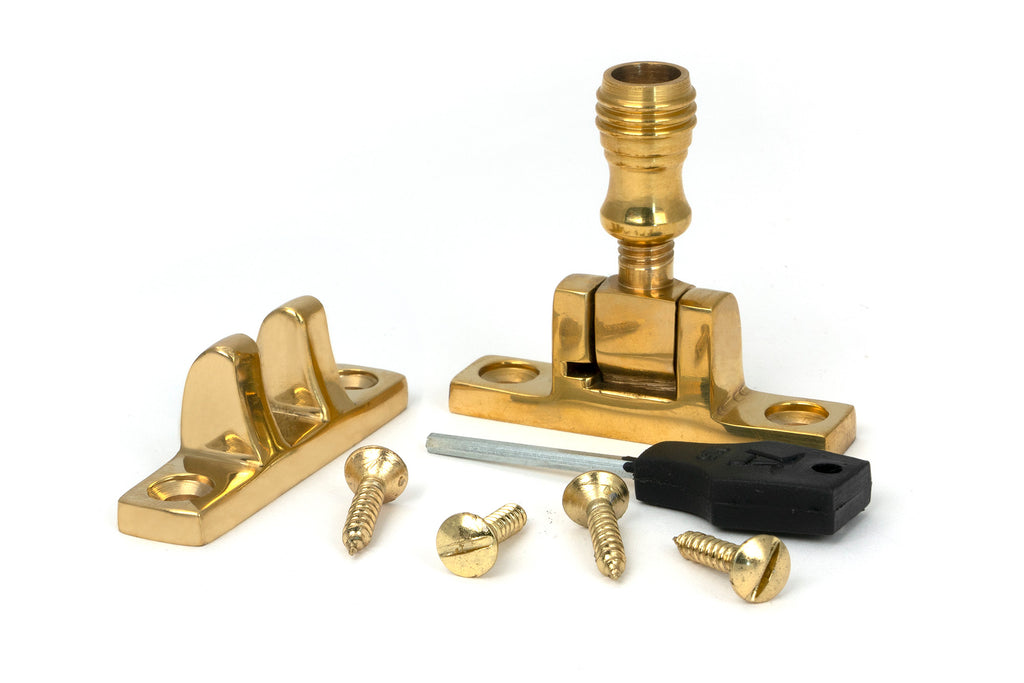 White background image of From The Anvil's Polished Brass Prestbury Brighton Fastener | From The Anvil