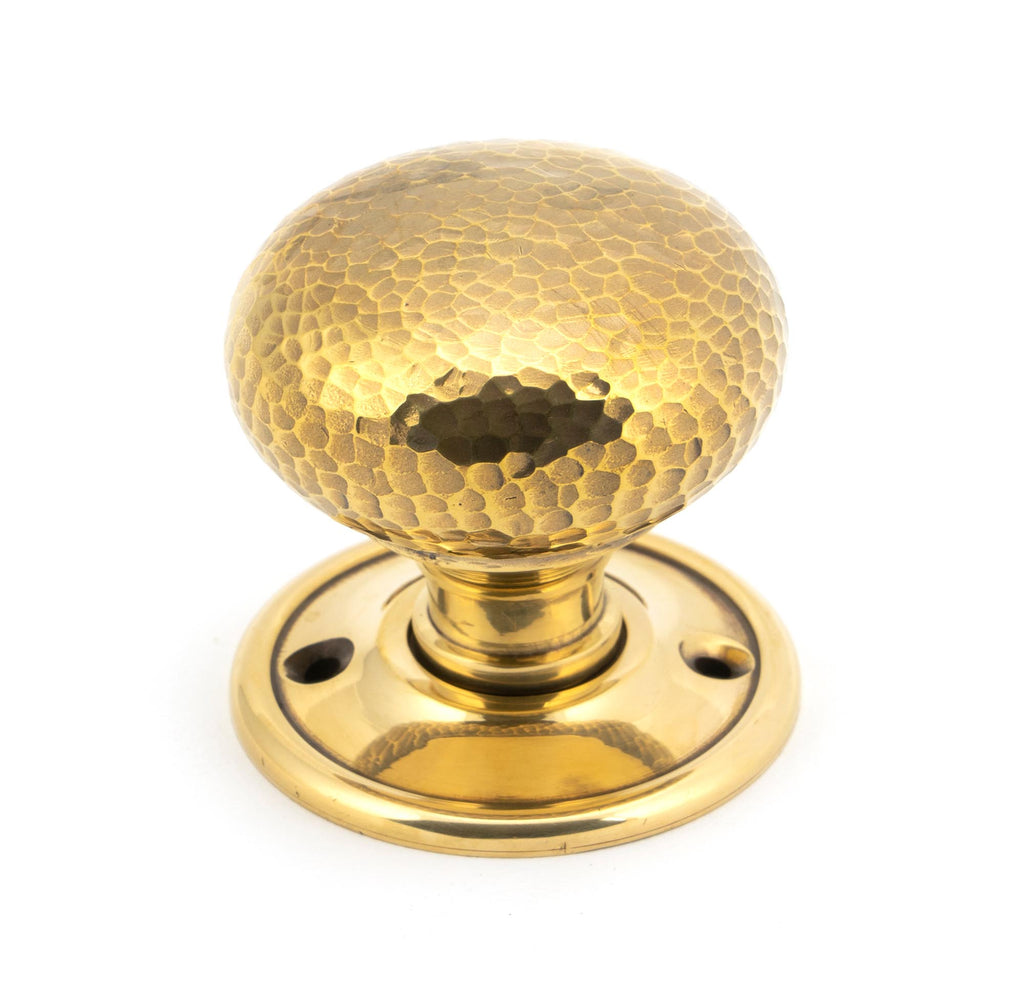 White background image of From The Anvil's Aged Brass Hammered Mushroom Mortice/Rim Knob Set | From The Anvil