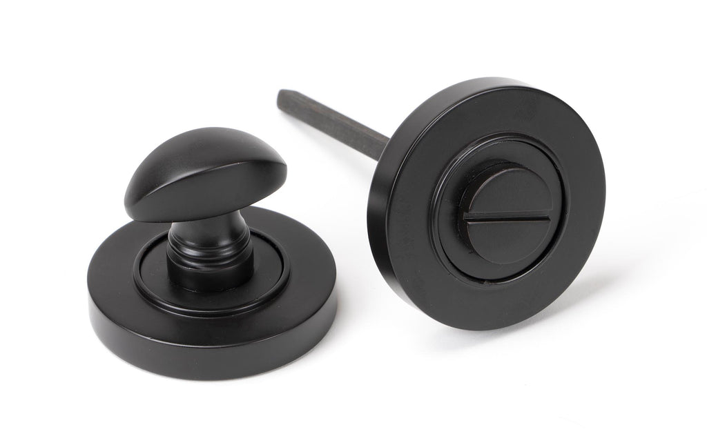 White background image of From The Anvil's Aged Bronze Round Thumbturn Set | From The Anvil