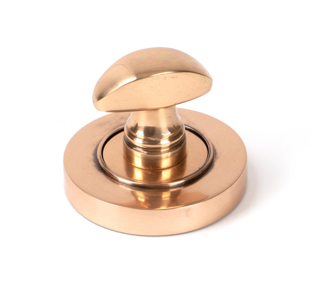 White background image of From The Anvil's Polished Bronze Round Thumbturn Set | From The Anvil