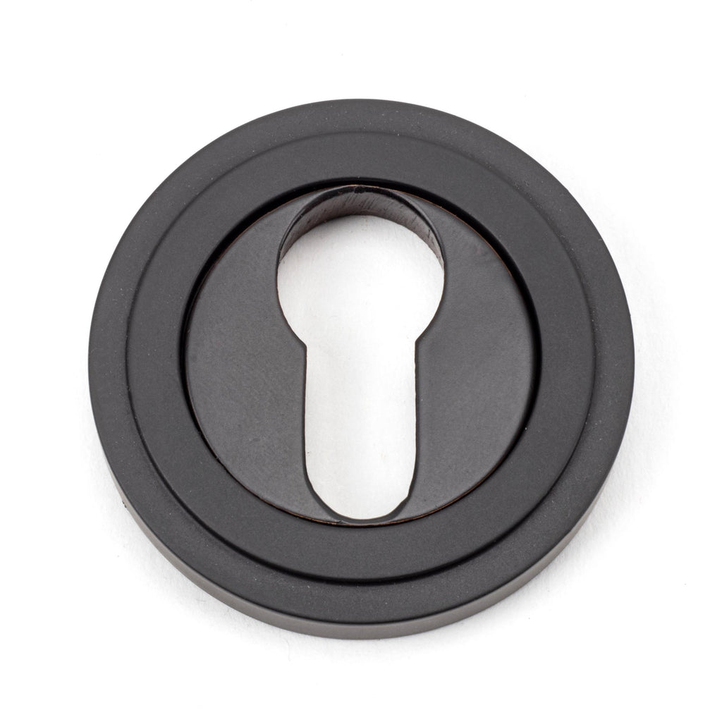 White background image of From The Anvil's Aged Bronze Round Euro Escutcheon | From The Anvil