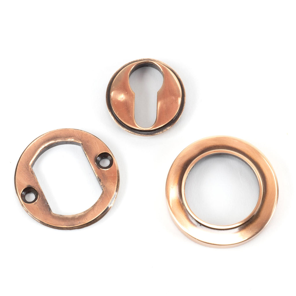 White background image of From The Anvil's Polished Bronze Round Euro Escutcheon | From The Anvil