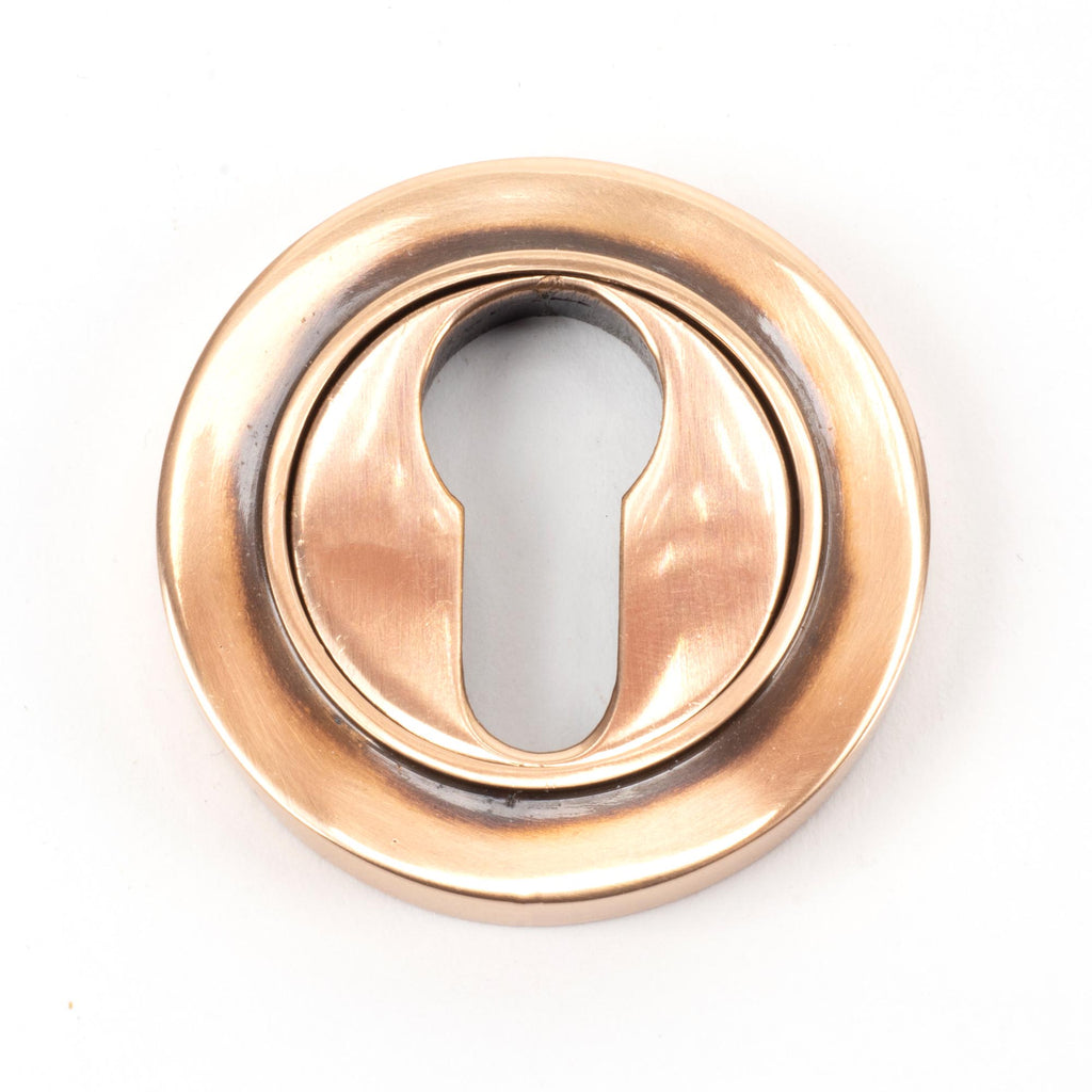 White background image of From The Anvil's Polished Bronze Round Euro Escutcheon | From The Anvil