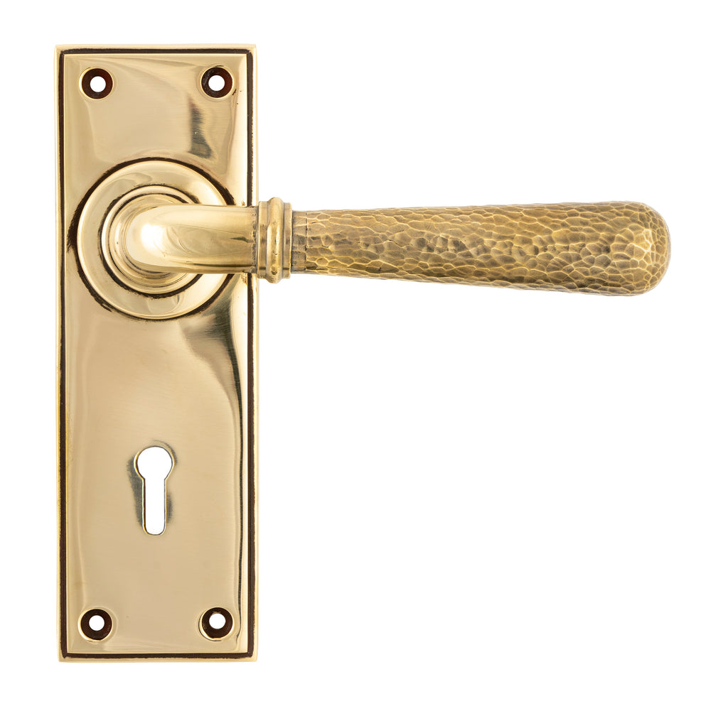 From The Anvil's Aged Brass Hammered Newbury Lever Lock Set