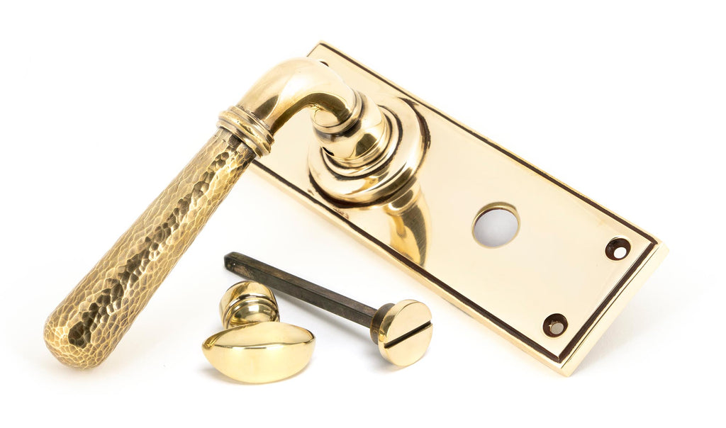 White background image of From The Anvil's Aged Brass Hammered Newbury Lever Bathroom Set | From The Anvil