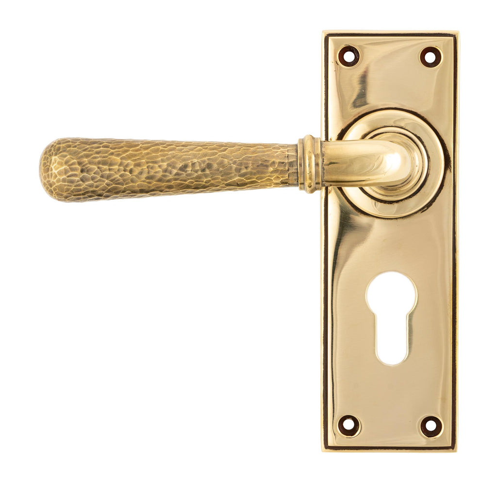 White background image of From The Anvil's Aged Brass Hammered Newbury Lever Euro Lock Set | From The Anvil