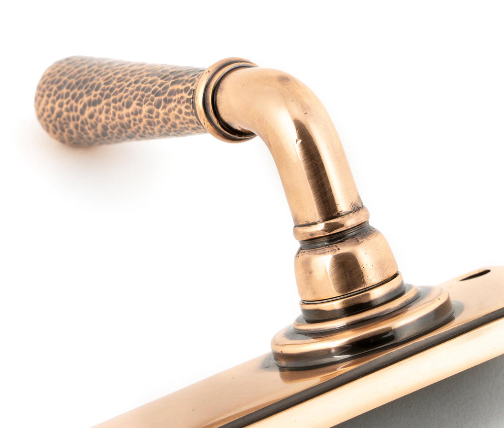 White background image of From The Anvil's Polished Bronze Hammered Newbury Lever Bathroom Set | From The Anvil