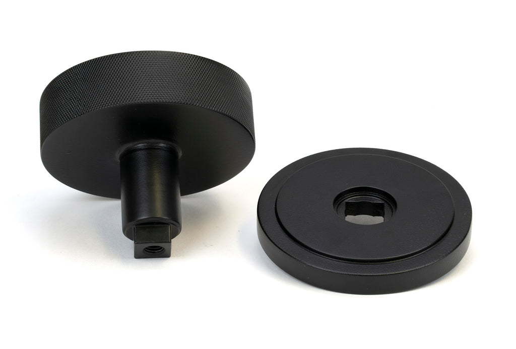 White background image of From The Anvil's Matt Black Brompton Centre Door Knob | From The Anvil