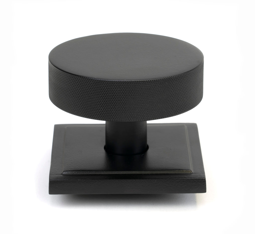 White background image of From The Anvil's Matt Black Brompton Centre Door Knob | From The Anvil