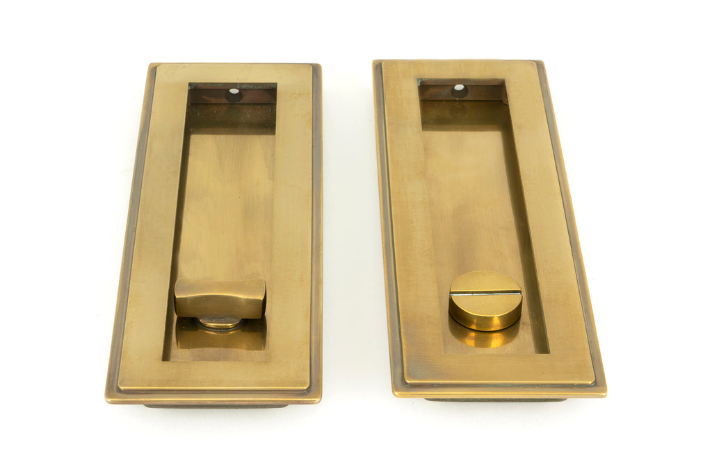 White background image of From The Anvil's Aged Brass Art Deco Rectangular Pull - Privacy Set | From The Anvil