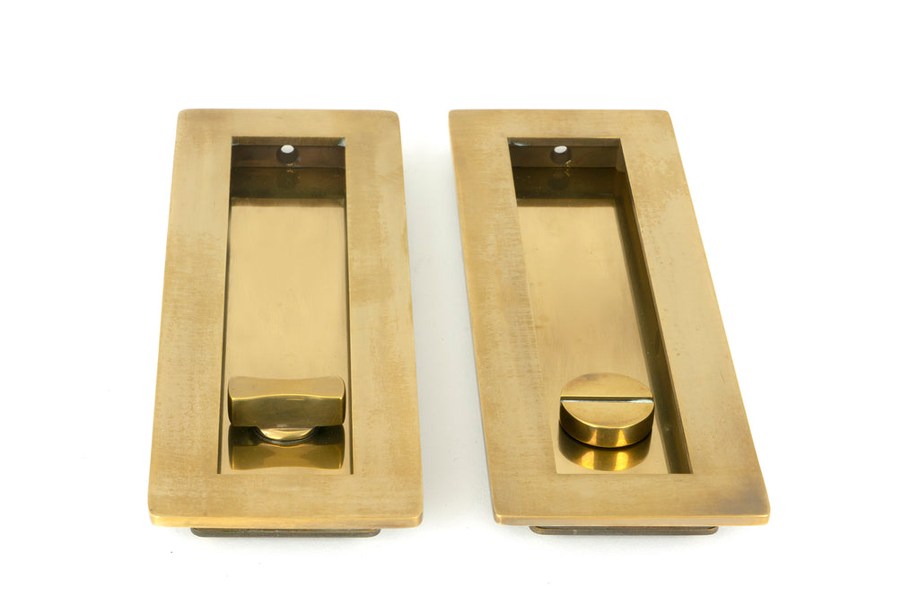 White background image of From The Anvil's Aged Brass Plain Rectangular Pull - Privacy Set | From The Anvil