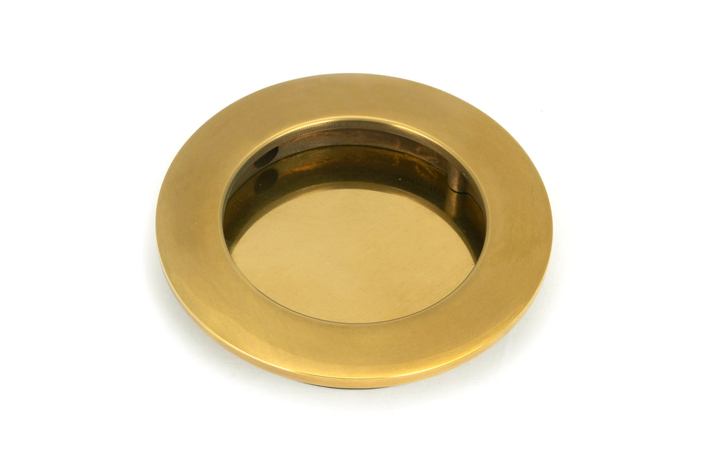 White background image of From The Anvil's Aged Brass Plain Round Pull | From The Anvil