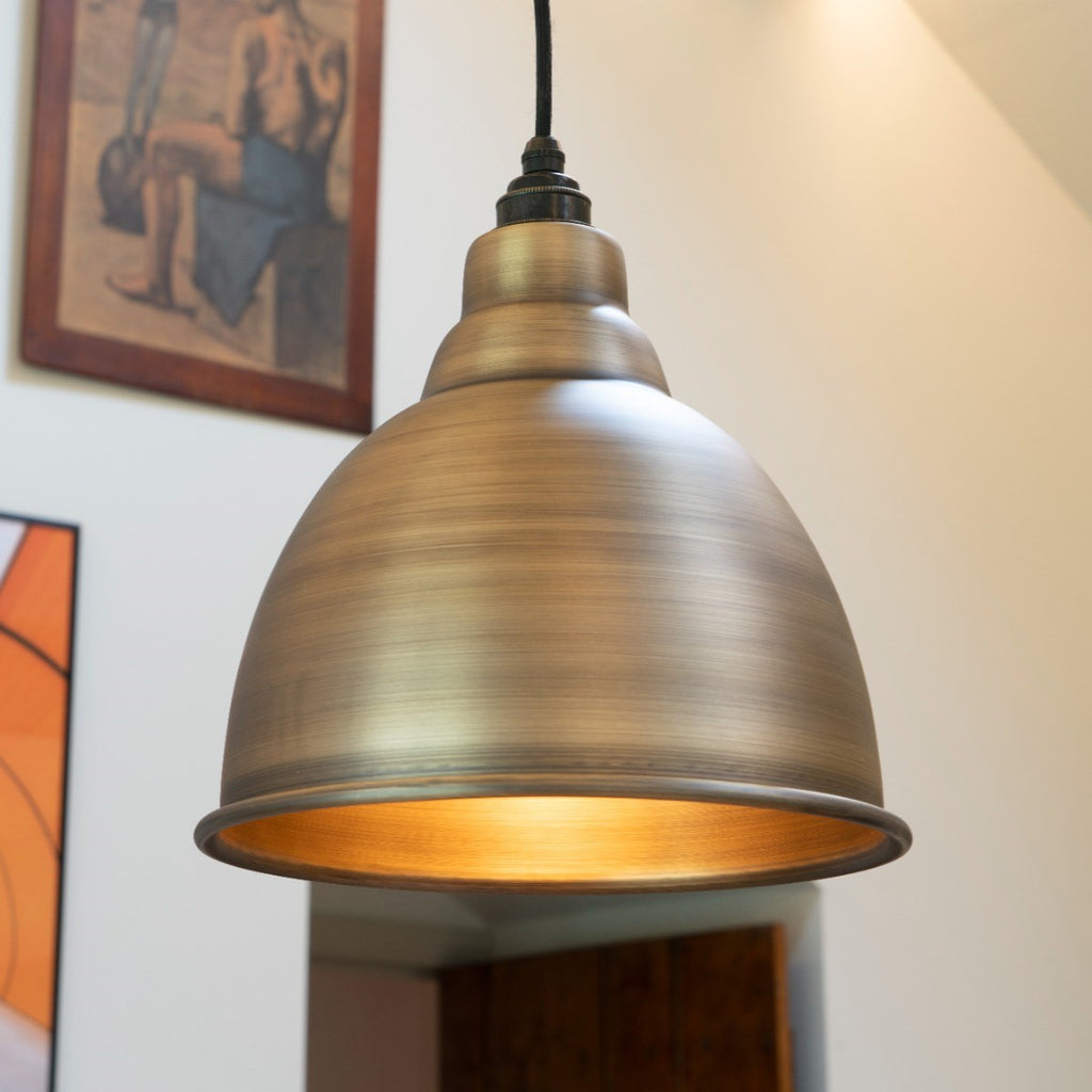 Aged Brass Brindley industrial style ceiling pendant light.