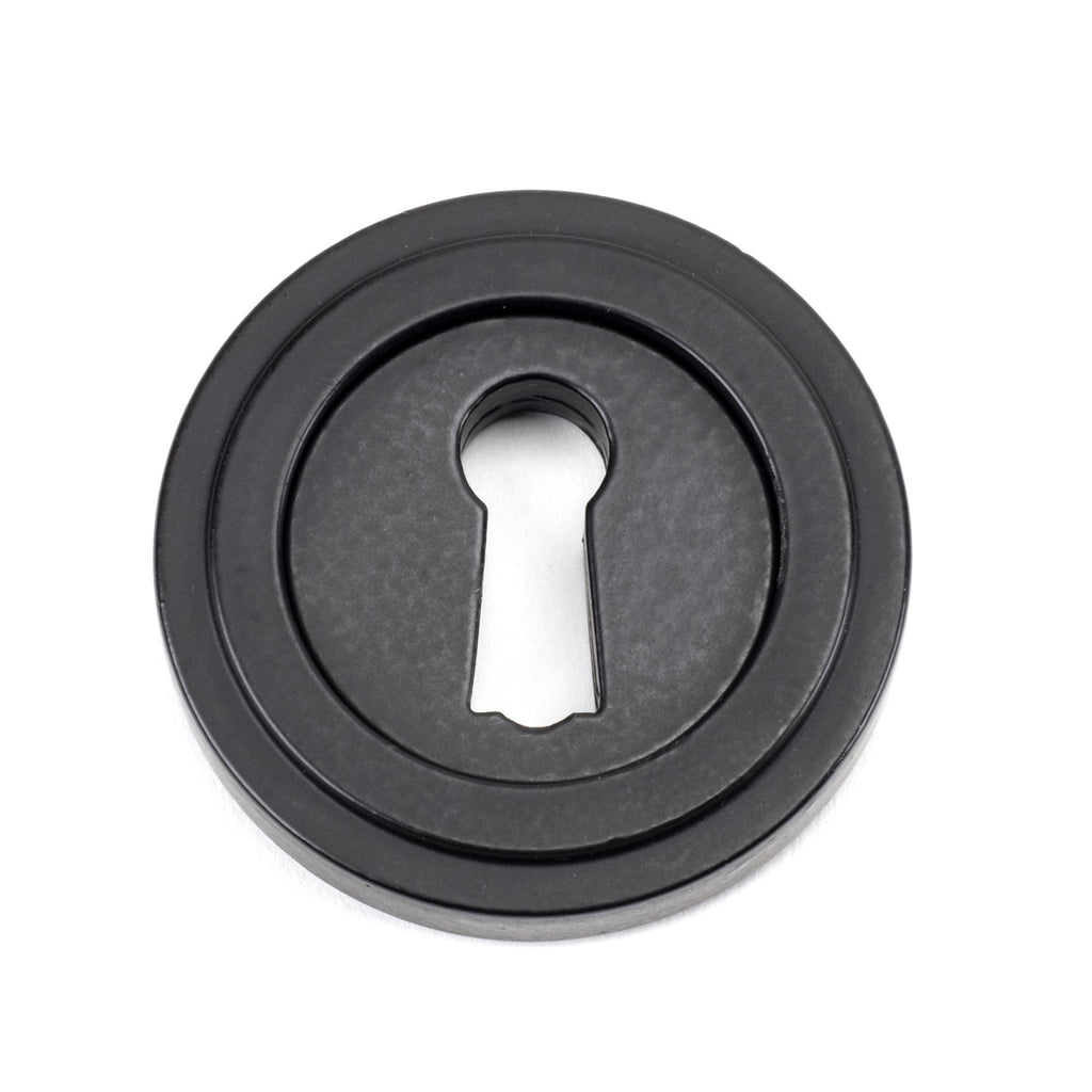 White background image of From The Anvil's Matt Black Round Escutcheon | From The Anvil