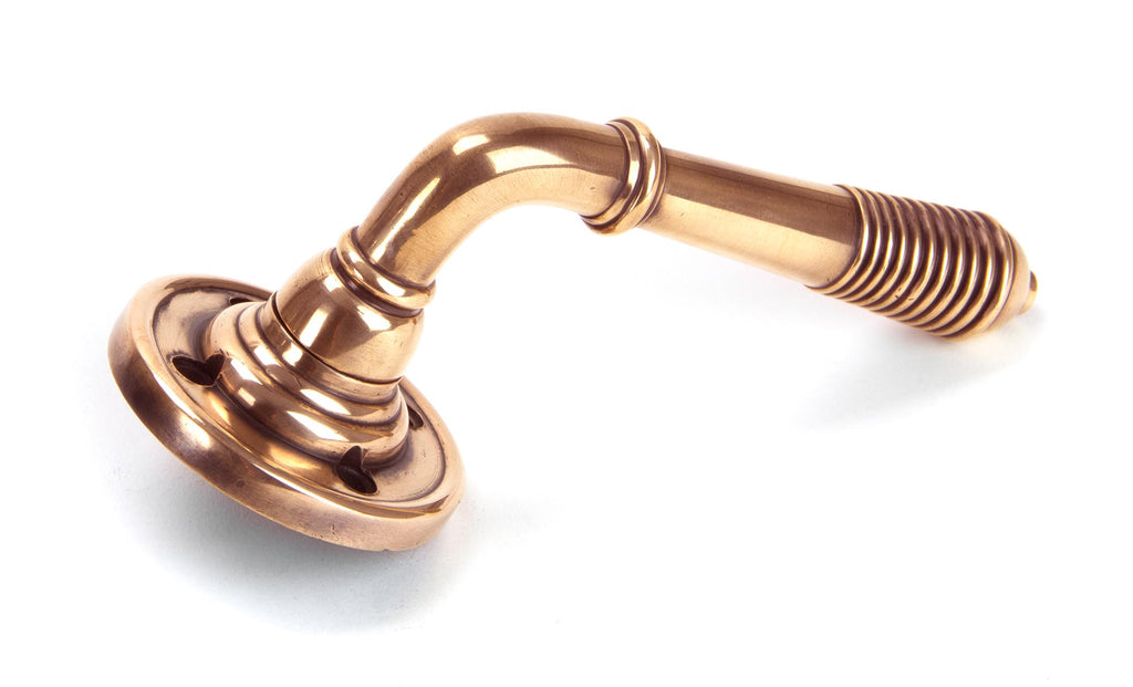 White background image of From The Anvil's Polished Bronze Reeded Lever on Rose Set | From The Anvil