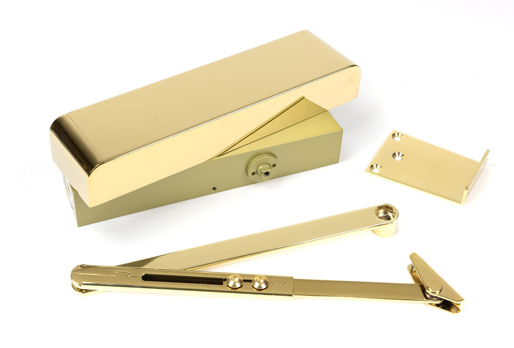 White background image of From The Anvil's Polished Brass Size 2-5 Door Closer | From The Anvil