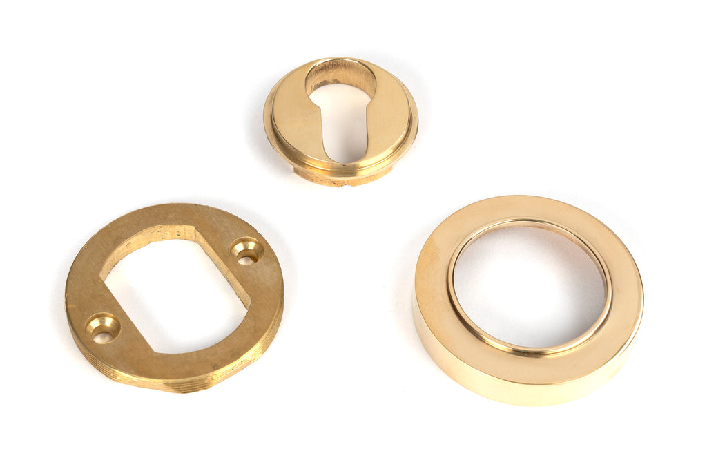 White background image of From The Anvil's Polished Brass Round Euro Escutcheon | From The Anvil